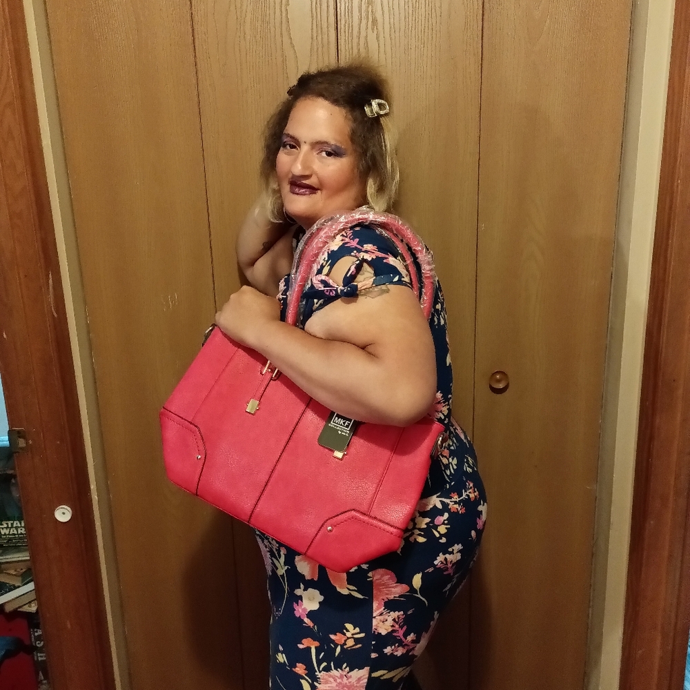 Red purse. Brand MKF